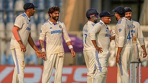 AP : Ravindra Jadeja celebrates with teammates, the wicket of Ish Sodhi during the second day of the third Test between India and New Zealand in Mumbai.