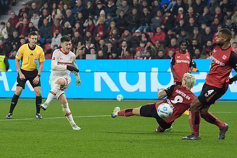 Bundesliga soccer 2024-25: Stuttgart's Angelo Stiller, second left, makes an attempt to score