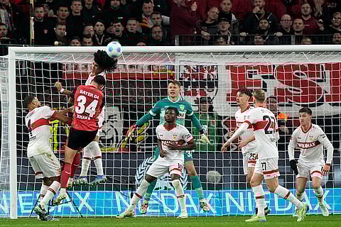 Bundesliga soccer 2024-25: Stuttgart's Anrie Chase saves the ball from Leverkusen's Granit Xhaka