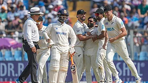 AP : IND Vs NZ 3rd Test: Ajaz Patel, center, celebrates with teammates after the dismissal of India's Sarfaraz Khan during the third day at Wankhede Stadium.