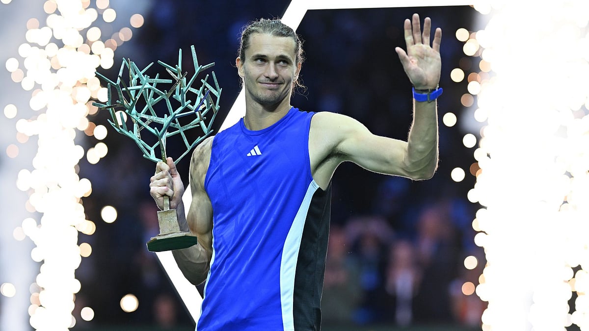 Alexander Zverev celebrates with the trophy