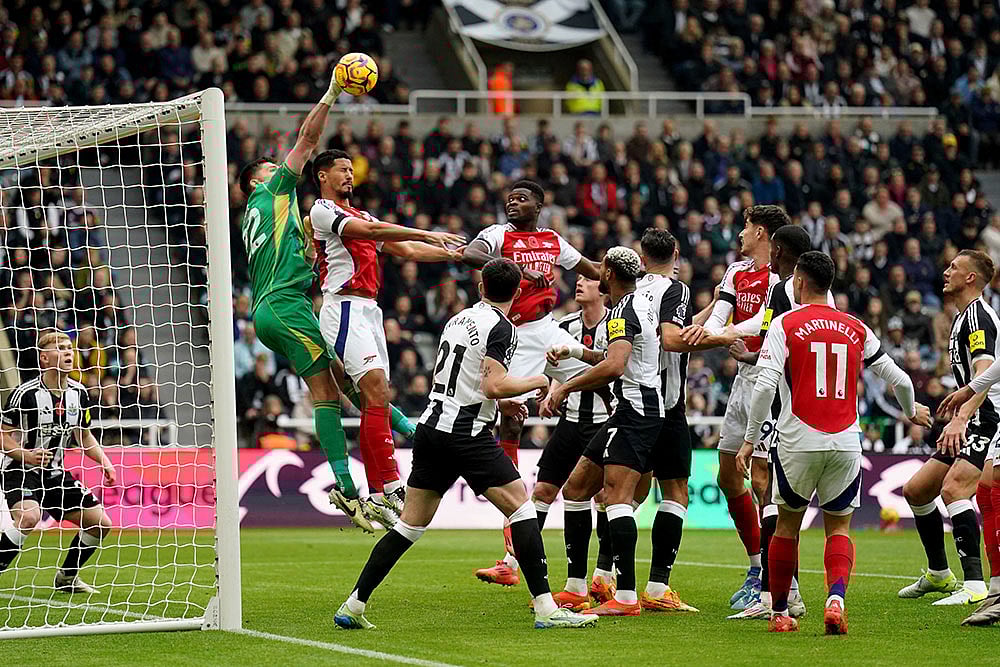 | Photo: Owen Humphreys/PA via AP : Britain Soccer Premier League: Arsenal Vs Newcastle United