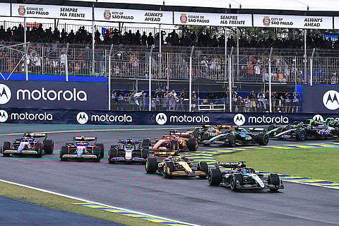 Brazilian Grand Prix 2024: Mercedes driver George Russell of Britain, right, steers his car