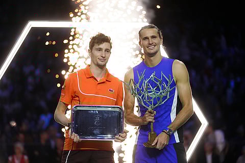 Paris Masters Tennis: Second-place France's Ugo Humbert, left, poses with the winner, Germany's Alexander Zverev