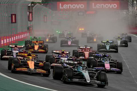Brazilian Grand Prix 2024: George Russell, of Britain, leads on his Mercedes after the start