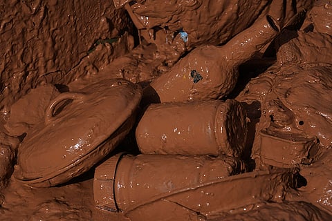 Spain Floods: Utensils are seen covered in the mud near Valencia