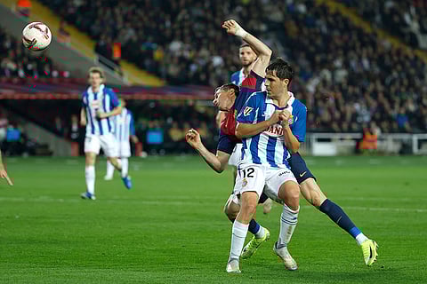 La Liga 2024-25: Barcelona's Robert Lewandowski heads the ball ahead of Espanyol's Alvaro Tejero