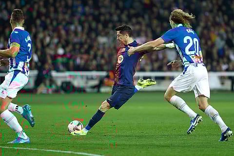 La Liga 2024-25: Barcelona's Robert Lewandowski, centre, makes an attempt to score