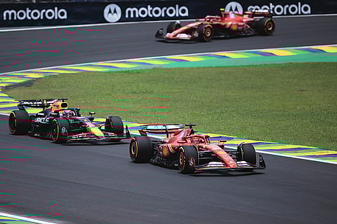 Brazilian Grand Prix 2024: Ferrari driver Charles Leclerc, right, followed by Red Bull driver Max Verstappen steer their cars