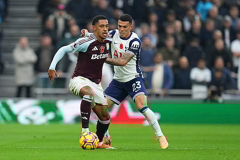 EPL 2024-25: Aston Villa's Jacob Ramsey, left, and Tottenham's Pedro Porro challenge for the ball