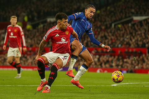 EPL 2024-25: Manchester United's Lisandro Martinez is challenged by Chelsea's Malo Gusto