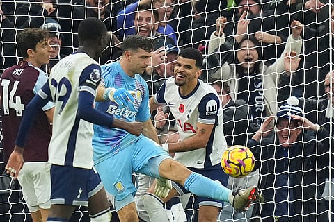 EPL 2024-25: Tottenham's Dominic Solanke, right, celebrates after scoring his side's third goal