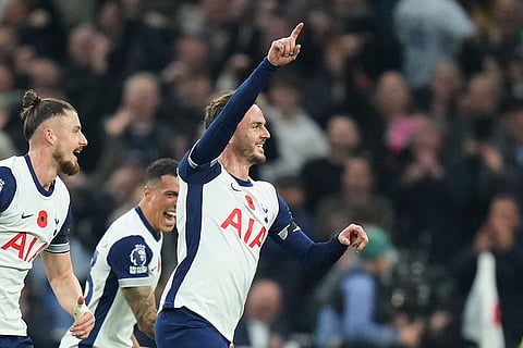 EPL 2024-25: Tottenham's James Maddison, right, celebrates with teammates after scoring his side's fourth goal