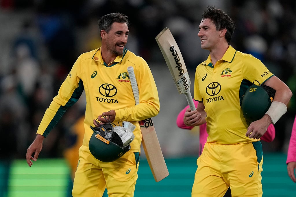 AP/Asanka Brendon Ratnayake : Pat Cummins and Mitchell Starc.
