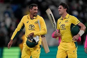 AP/Asanka Brendon Ratnayake : Pat Cummins and Mitchell Starc.