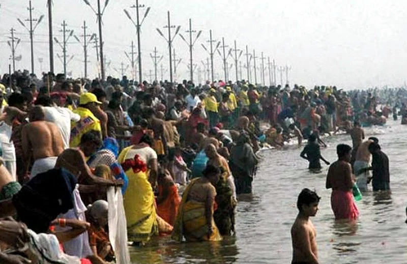 Devotees taking a dip in Yamuna