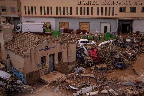 Spain Floods: Vehicles trapped after the flood in Catarroja
