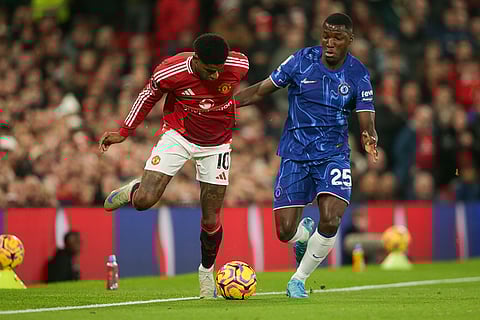EPL 2024-25: Manchester United's Marcus Rashford, left, is challenged by Chelsea's Moises Caicedo