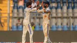 AP : Virat Kohli and Ravindra Jadeja in action during the third Test between India and New Zealand in Mumbai.
