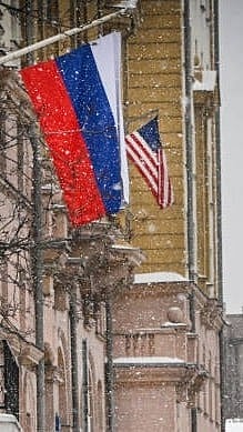 Getty Images : Flags of Russia (front) and the United States | 