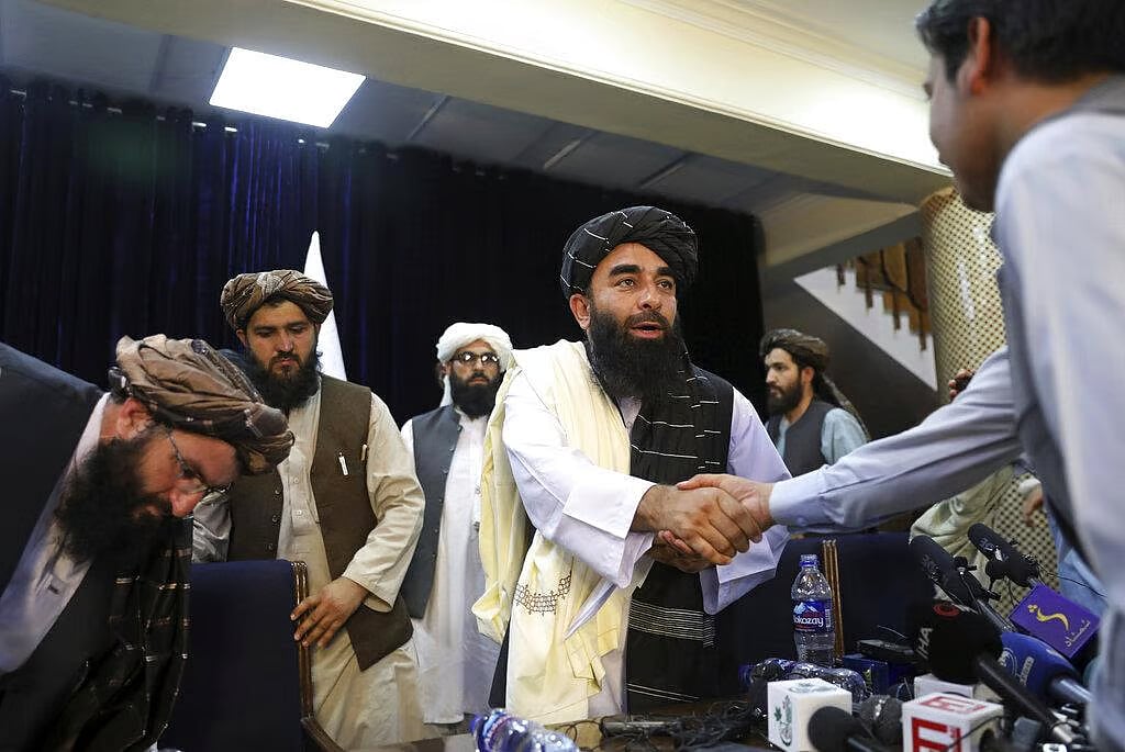 AP : 
The Taliban also released photographs from the meeting, showing their delegation seated across from US representatives. 