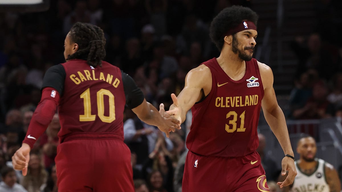 Darius Garland and Jarrett Allen of the Cleveland Cavaliers celebrate vs. the Milwaukee Bucks on Nov. 4, 2024. - null