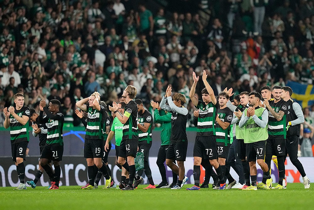 | Photo: AP/Armando Franca : Champions League 2024-25: Sporting players leave the pitch after match against Manchester City