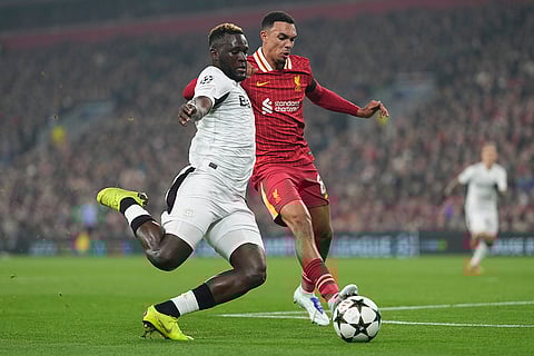 Champions League 2024-25: Leverkusen's Victor Boniface, left, is challenged by Liverpool's Trent Alexander-Arnold