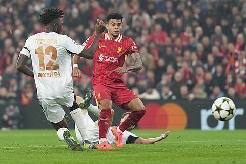 Champions League 2024-25: Liverpool's Luis Diaz, right, scores his side's third goal