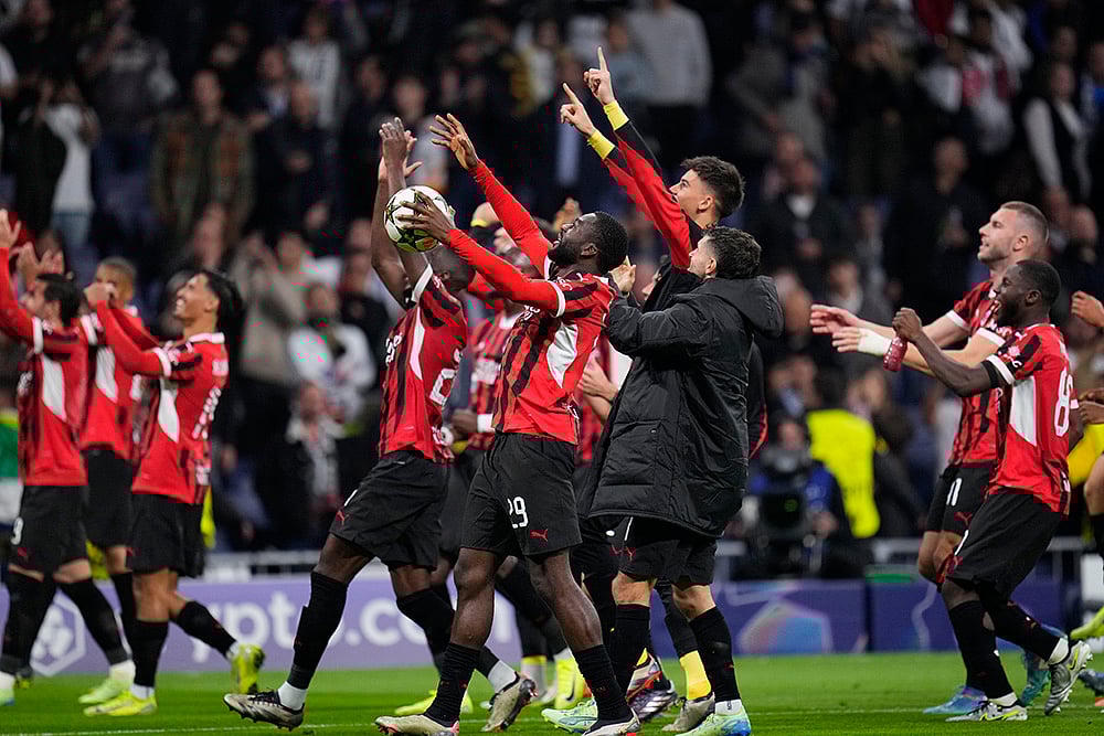 | Photo: AP/Manu Fernandez : Champions League 2024-25: Players of AC Milan celebrate defeating 3-1 Real Madrid