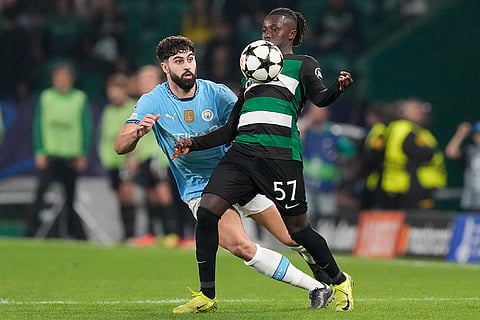 Champions League 2024-25: Sporting's Geovany Quenda, front, and Manchester City's Josko Gvardiol fight for the ball