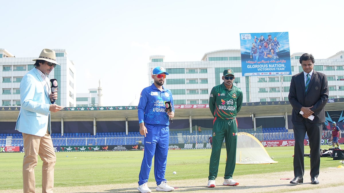 Photo: X | Afghanistan Cricket Board : Afghanistan captain Hashmatullah Shahidi and Bangladesh skipper Najmul Hossain Shanto during the toss for the 1st ODI match in Sharjah.