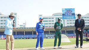 Photo: X | Afghanistan Cricket Board : Afghanistan captain Hashmatullah Shahidi and Bangladesh skipper Najmul Hossain Shanto during the toss for the 1st ODI match in Sharjah.