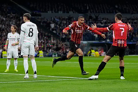 Champions League 2024-25: AC Milan's Malick Thiaw, center, celebrates after scoring the opening goal