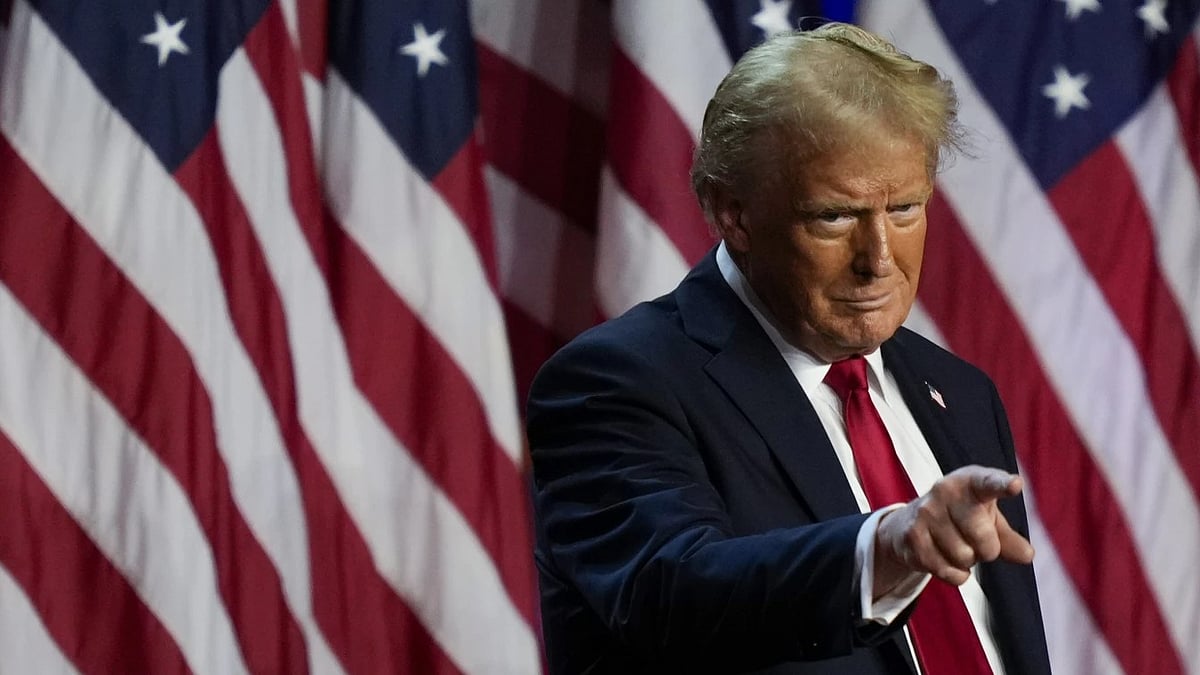 Republican presidential nominee former President Donald Trump points to the crowd at an election night watch party, Wednesday, Nov. 6, 2024, in West Palm Beach, Fla. - AP