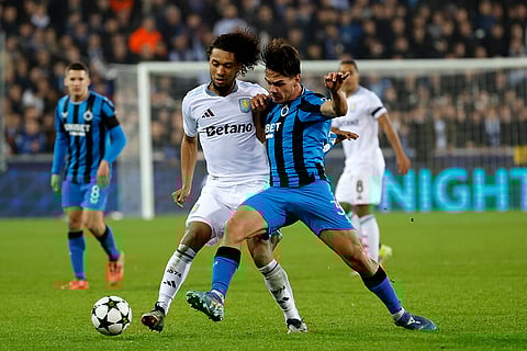 UEFA Champions League: Brugge's Ardon Jashari, right, and Aston Villa's Boubacar Kamara fight for the ball