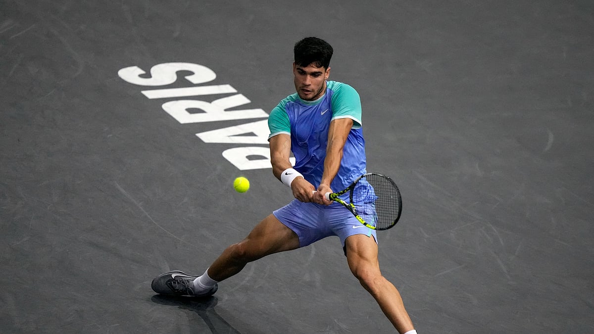 Spain's Carlos Alcaraz makes a return to France's Ugo Humbert during their third-round match of the Paris Masters tennis tournament at the Accor Arena. - AP Photo/Michel Euler