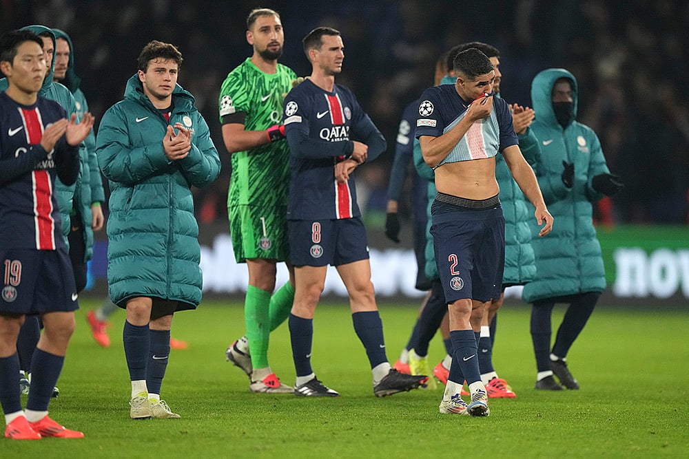 | Photo: AP/Michel Euler : UEFA Champions League: PSG's players are seen after the end of the against Atletico Madrid 