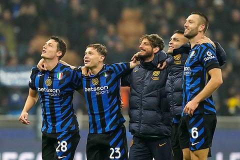 UEFA Champions League: Inter Milan's players celebrate after winning against Arsenal
