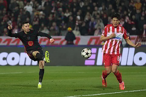 UEFA Champions League: Barcelona's Robert Lewandowski shoots the ball