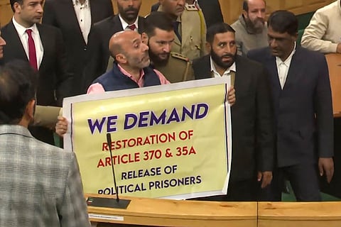 Sheikh Khursheed displays banner in J-K Assembly