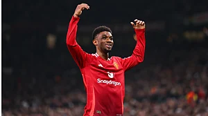 Amad Diallo celebrates for Manchester United.