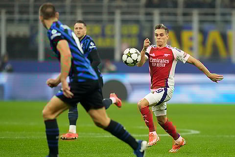 UEFA Champions League: Arsenal's Leandro Trossard, right, controls the ball