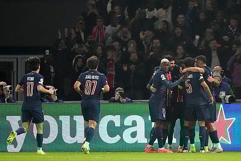 UEFA Champions League: PSG's players celebrate a goal from their teammate Warren Zaire-Emery