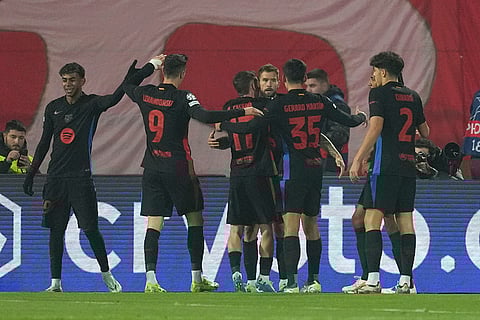 UEFA Champions League: Barcelona players celebrate after a goal