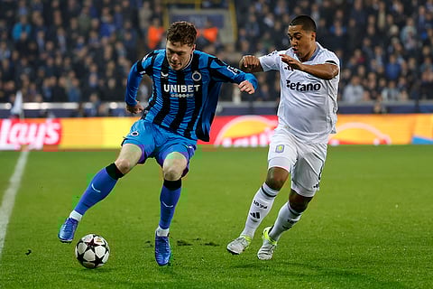 UEFA Champions League: Brugge's Andreas Skov Olsen, left, and Aston Villa's Youri Tielemans fight for the ball