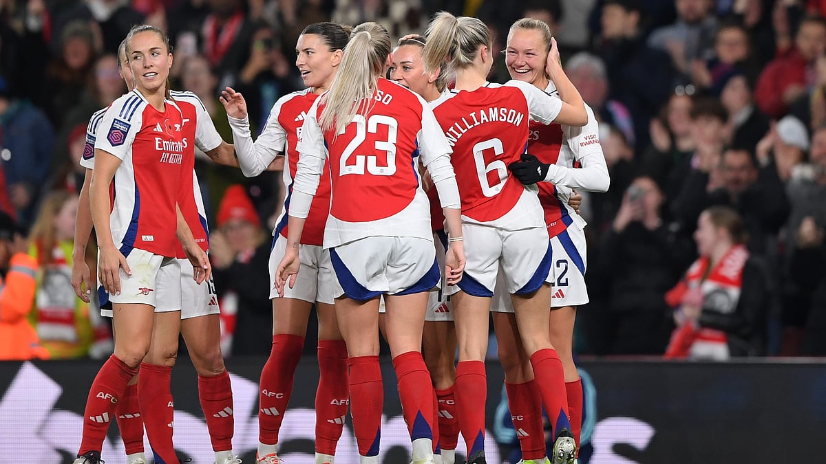 Arsenal celebrate their third goal in their big win over Brighton