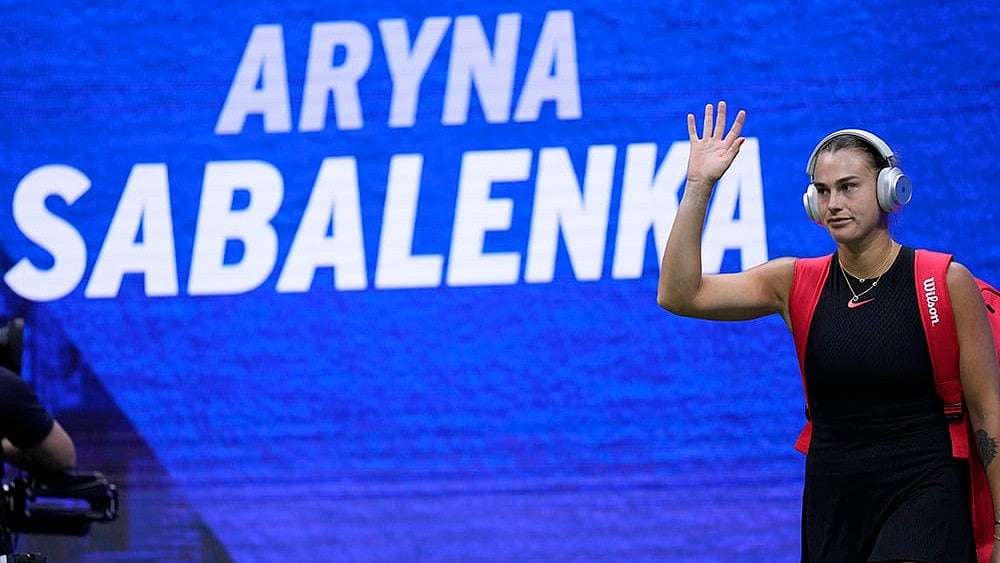 | Photo: AP/Seth Wenig : US Open Tennis Semifinal 2024: Aryna Sabalenka, of Belarus, waves as she walks onto the court