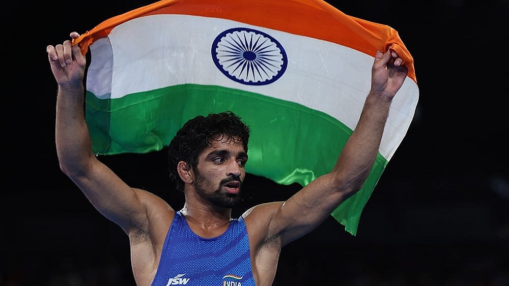 | Photo: EPA-EFE/VASSIL DONEV VIA PTI : Men's 57kg free-style wrestling: Aman Sehrawat of India celebrates defeating Darian Toi Cruz of Puerto Rico 
