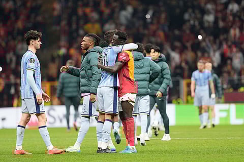 Europa League: Tottenham's Rodrigo Bentancur hugs with Galatasaray's Davinson Sanchez after the match
